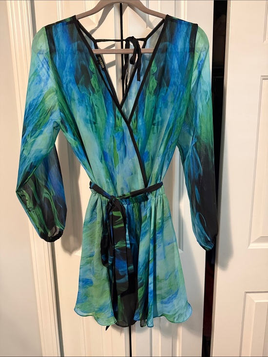 Dolcessa Other - Dolcessa Sheer Blue-Green Wrap romper Dress with Black Trim